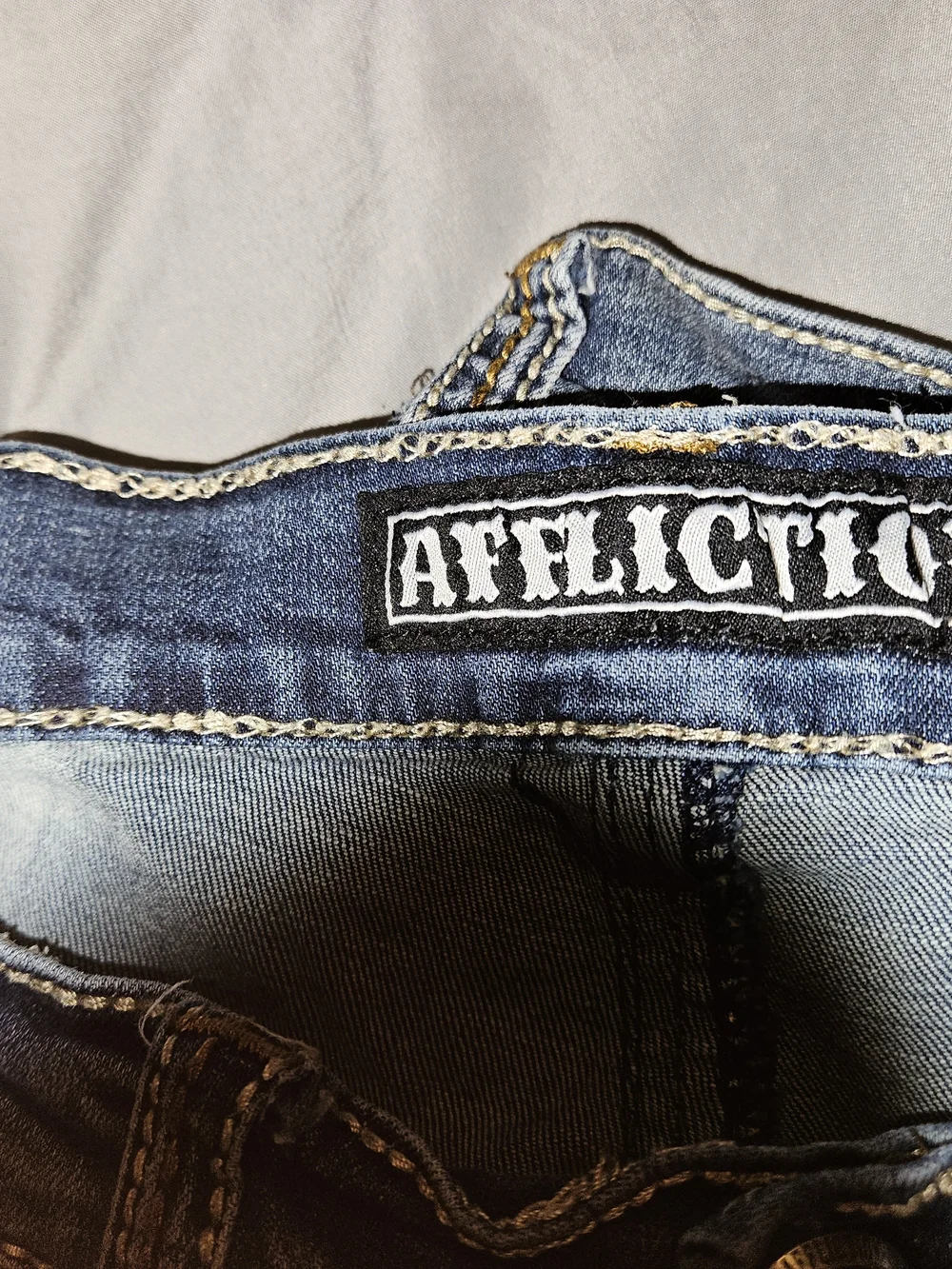 Affliction light blue